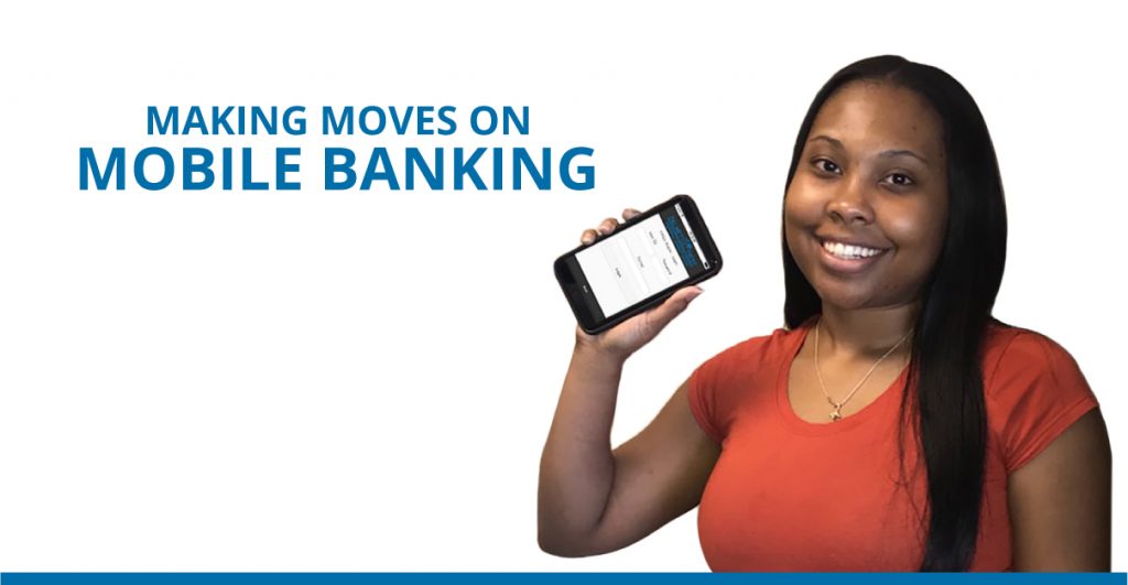 Making moves on mobile banking. Woman standing smiling with cell phone.