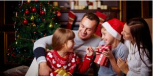 Family opening Christmas presents