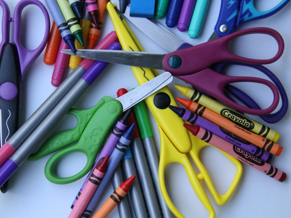 School supplies scattered on desk