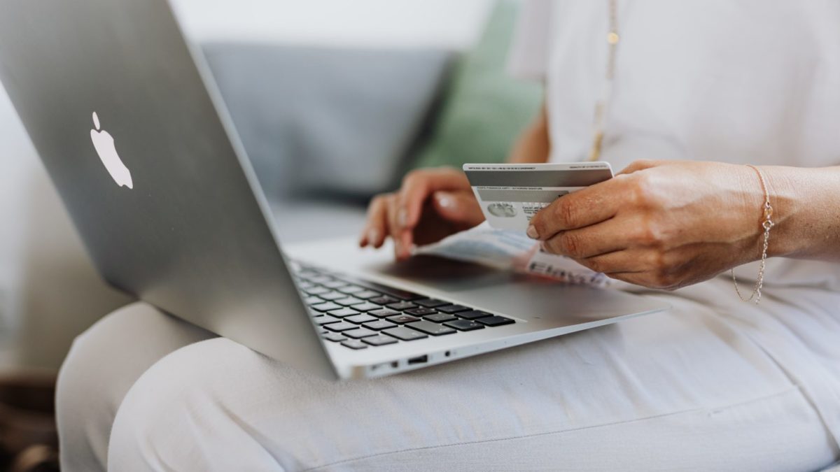 Women sitting with laptop and credit card